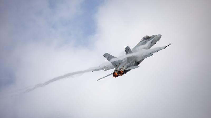 Aircraft A21-02 flown by Group Captain Jason Easthope, Chief of Staff, Air Combat Group puts on the last handling display for a RAAF F/A-18 Hornet at RAAF Base Williamtown. Photo: Corporal Craig Barrett
