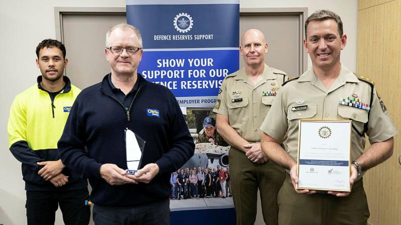Corporal Rhys Hadfield, left, O’Brien Electrical  and Data Joondalup's Jason Bridges, Warrant Officer Class One Peter Duff, and Commanding Officer 16th Battalion, Royal Western Australia Regiment, Lieutenant Colonel Leigh Partridge.