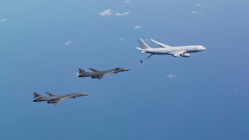 A RAAF KC-30A multi-role tanker transport aircraft, right, and two United States Air Force B-1B Lancer bombers fly in formation over the Northern Territory. Photo: Leading Aircraftwoman Emma Schwenke
