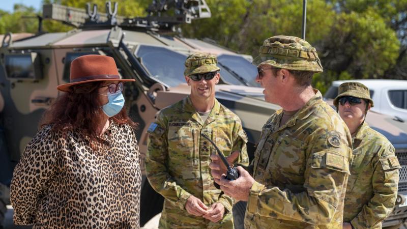 The Minister for Defence Industry Melissa Price speaks with Commanding Officer of 3rd Battery Major Duncan Anderson during a live-fire exercise at Lancelin Training Area, Western Australia. Photo: Leading Seaman Ronnie Baltoft