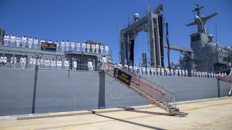 HMAS Stalwart's Ship's Company line the upper decks for the first time during a commissioning ceremony at Fleet Base West, Rockingham. Photo: Leading Seaman Ernesto Sanchez