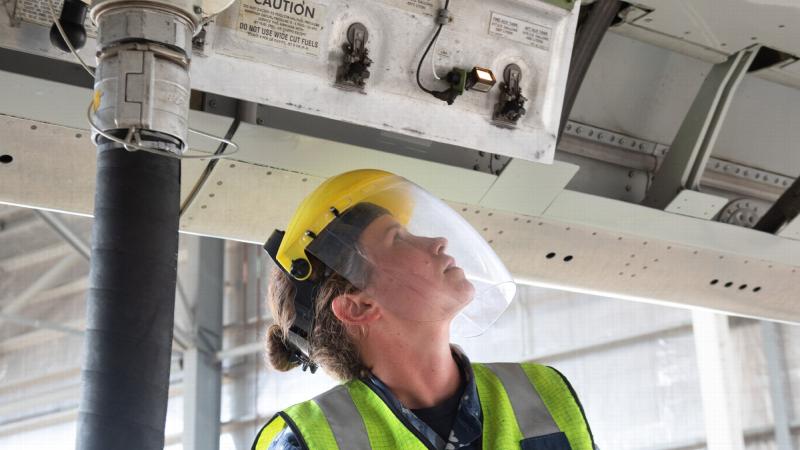 Leading Aircraftwoman Samantha Woods, of No. 2 Squadron, monitors fuel tank levels while refuelling an E-7A Wedgetail during Exercise Gauntlet Strike 20, at RAAF Base Tindal, NT. Photo: Petty Officer Peter Thompson