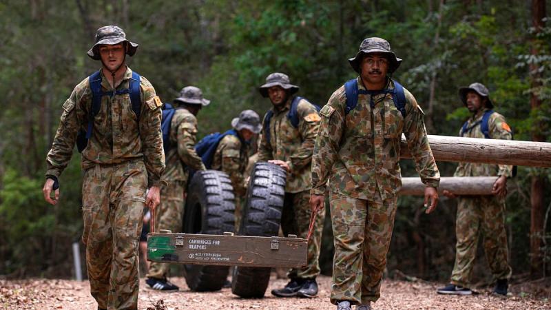 The Queensland Reds rugby team, hosted by the 6th Battalion, Royal Australian Regiment, conduct a stores carry during a three-day training camp at Kokoda Barracks, Canungra. Photo: Corporal Nicole Dorrett