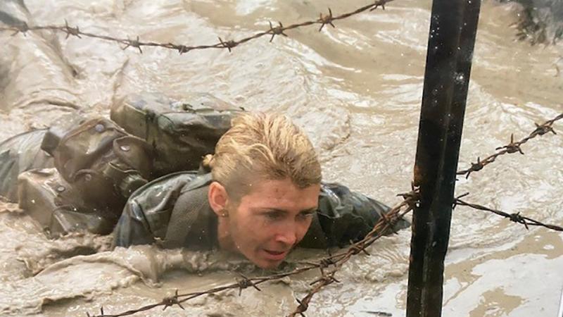 Sergeant Kym Walker tackles an obstacle course during Battle PT.