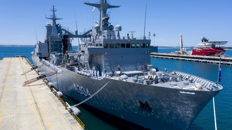 The crew of HMAS Stalwart line the ship's upper decks during its commissioning ceremony at Fleet Base West, Rockingham. Photo: Leading Seaman Richard Cordell