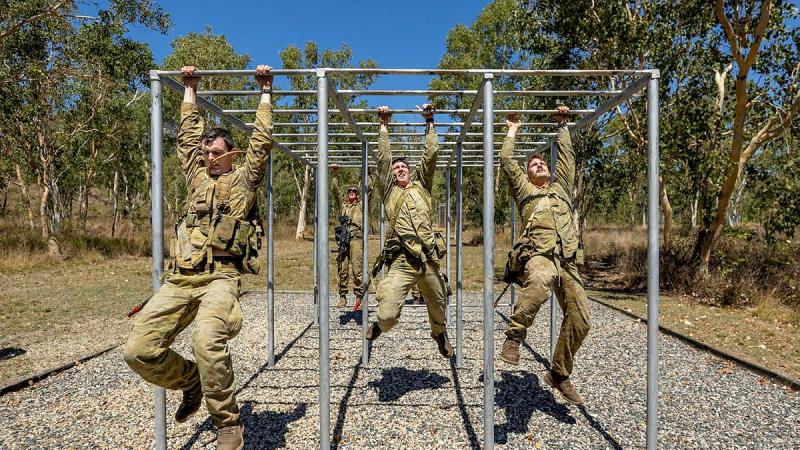 Soldiers from the 4th Regiment, Royal Australian Artillery, tackle the obstacle course during Exercise Turbulent Dawn, at Lavarack Barracks. Photo: Corporal Brandon Grey