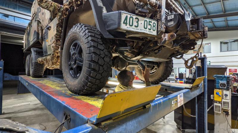 Army vehicle mechanic Warrant Officer Class Two James Gorman inspects a G-Wagon in the workshops of the 51st Battalion, Far North Queensland Regiment, at Porton Barracks in Cairns.