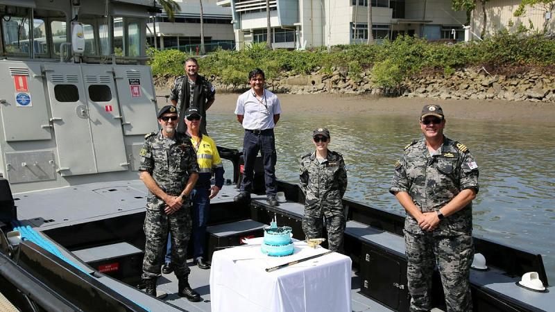 (L-R) LCDR Kevin Whatling, Naval Architect Mr Marc Richards, CHAP Bradley Galvin, Serco Marine Services Juan Camilo Ruiz Del Rio, Hydrographic Systems Operator Suzanne Burton and CO HMAS Cairns CMDR Glenn Williams on Naval Workboat Otter at HMAS Cairns.