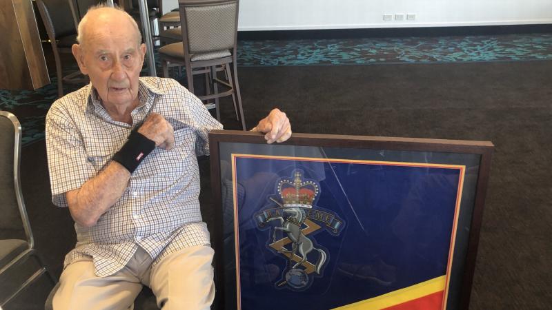 Herbert Barker celebrates his 100th birthday with family and friends on December 13.