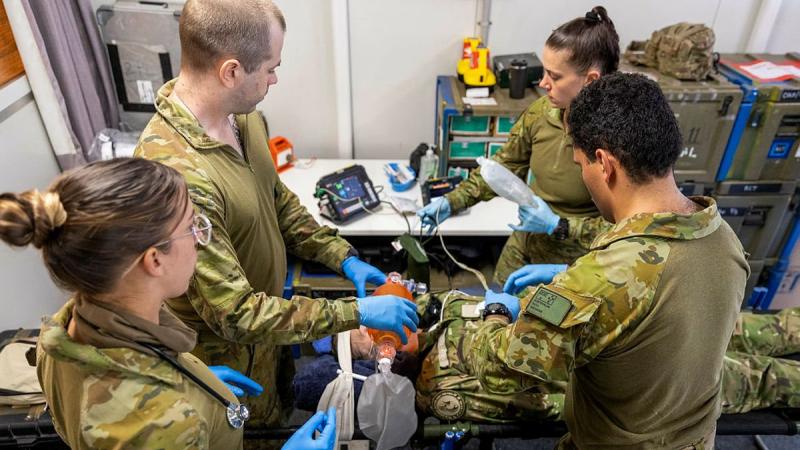The Australian Army medical team from Joint Task Group 637.3 treat a New Zealand Defence Force simulated patient during a casualty evacuation exercise at the Royal Solomon Islands Police Force Headquarters, Rove. Photo: Major Jillian Joyce