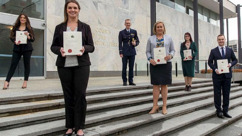 Pilot Officer Rachel Ibbotson, Flight Lieutenant Felicity Shearer, ADF Director General Legal Air Commodore Patrick Keane, Squadron Leader Courtney Westphal, Pilot Officer Allisha Harvey and Pilot Officer Jarrad Salmon. Photo: Private Jacob Joseph