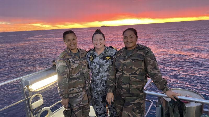 Lieutenant Commander Makaila Lasalo with women from the Tongan defence force.