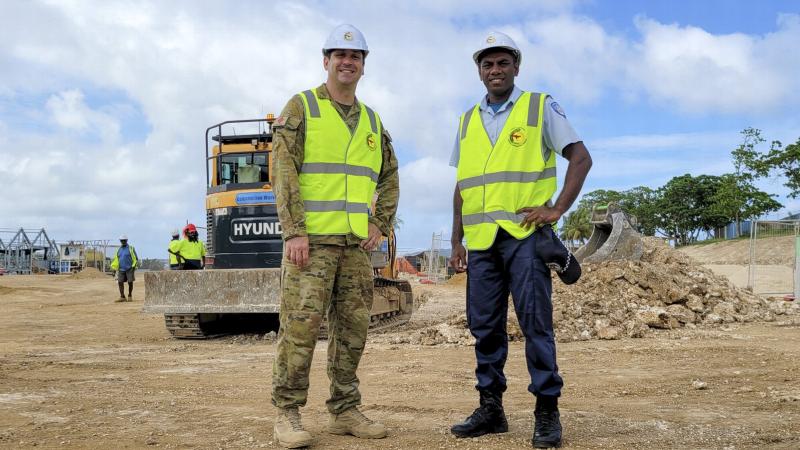 Australian Army Warrant Officer Class Two Jamie Miller and Vanuatu Police Force (VPF) Constable Junior Borenga at the construction site for Project 222 at Cook Barracks, Port Vila. Photo: Sackrine Kaman, VPF Media Team