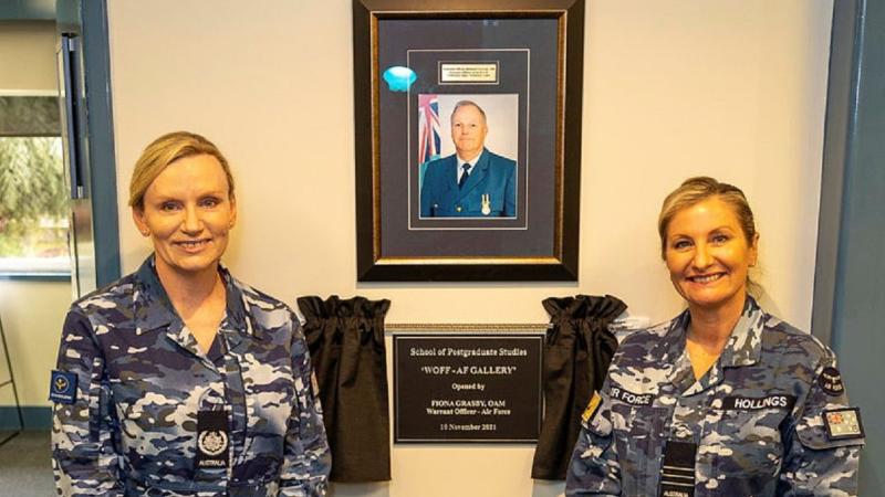 Warrant Officer of the Air Force Fee Grasby, left, and Commanding Officer of the RAAF School of Postgraduate Studies Wing Commander Kerry Hollings open the Warrant Officer of the Air Force Gallery at the school. Photo: Sergeant John Marshall
