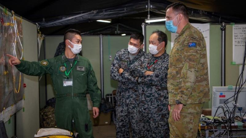 A Royal Australian Air Force officer receives a brief during Exercise Yama Sakura 81 in Japan.