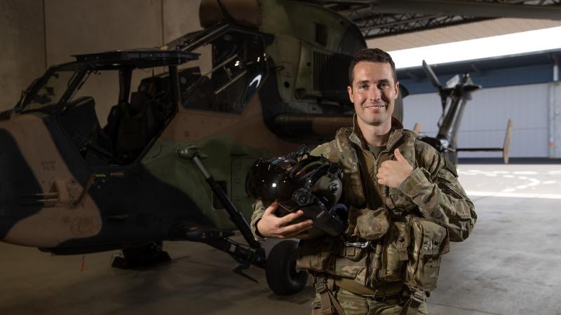 Army pilot Captain Shaun Gill in front of a Tiger armed reconnaissance helicopter from 1st Aviation Regiment at Robertson Barracks, NT. Photo: Corporal Rodrigo Villablanca.