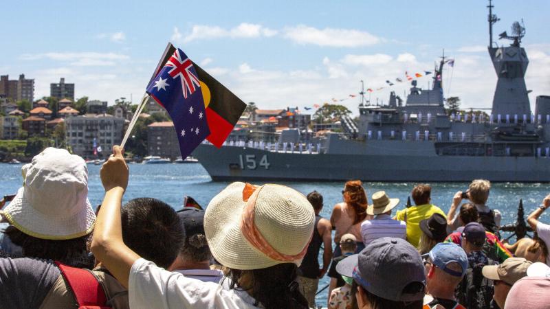 Royal Australian Navy frigate HMAS Parramatta sails past Australia Day crowds in Sydney. Photo: Leading Seaman Matthew Lyall.