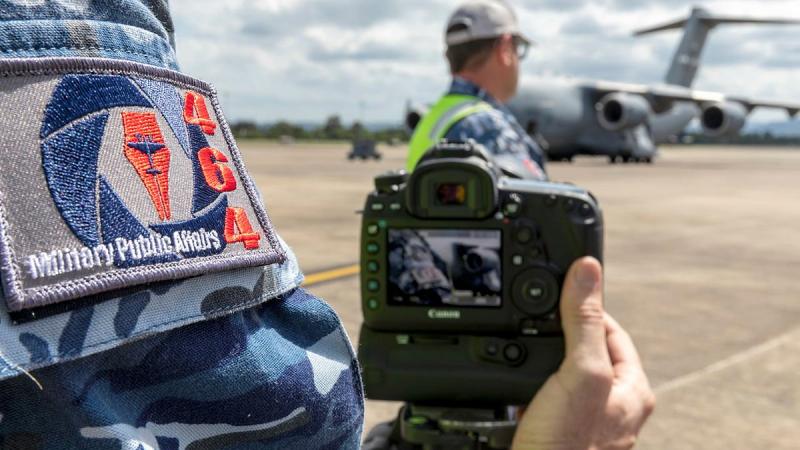 Air Force imagery specialists, from No. 464 Squadron, take imagery on the RAAF Base Richmond flightline. Photo: Corporal Dan Pinhorn