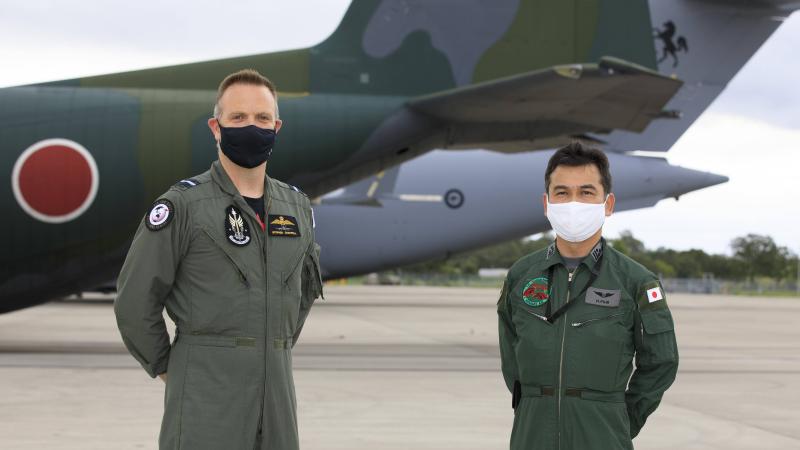 Director-General Air Command Operations Air Commodore Stephen Chappell and Japan Air Self-Defense Force Colonel Hiroshi Fujii at RAAF Base Amberley. Photo: Corporal Brett Sherriff