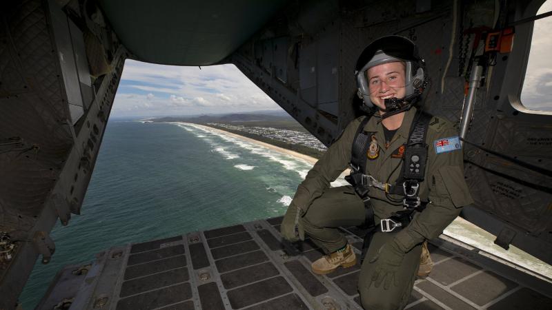 Corporal Tiana Heap enjoys the views of northern NSW during the first all-female crewed C-27J Spartan aircraft from No. 35 Squadron, based at RAAF Base Amberley. Photos: Leading Aircraftwoman Kate Czerny