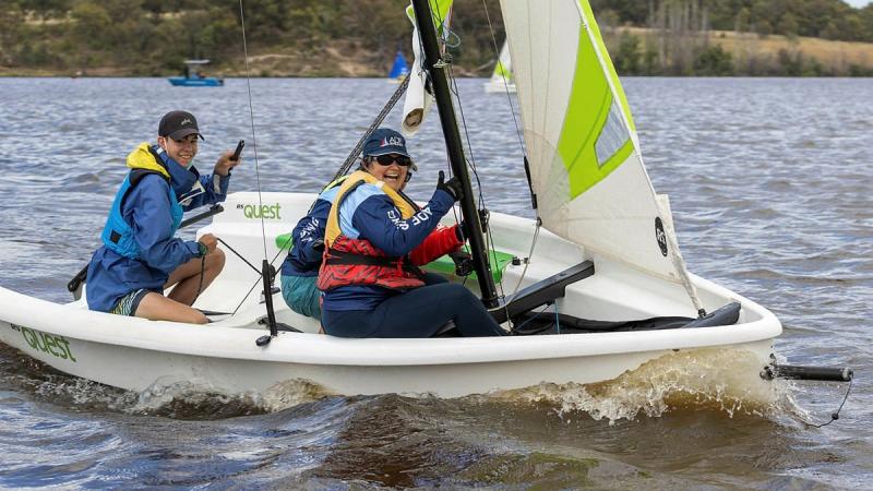 Flight Lieutenant Joy Clarke, right, takes part in the SheSails Discover Sailing Day run by the ADF Sailing Association in Canberra. Photo: Leading Aircraftwoman Jacqueline Forrester