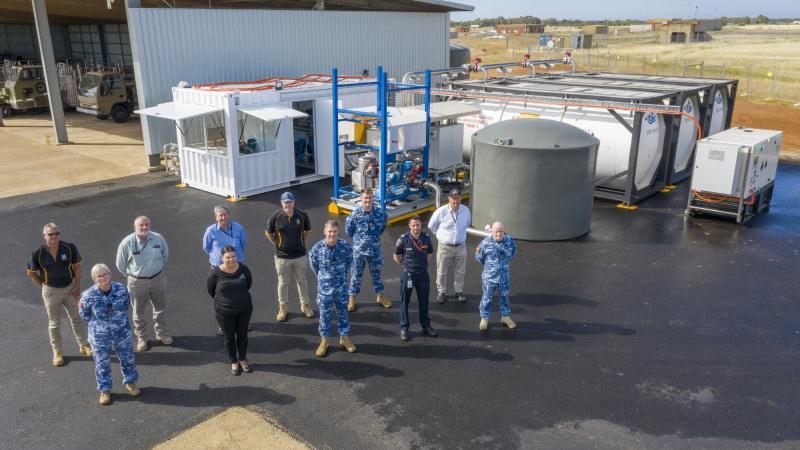 Defence and civilian personnel involved in successfully having the Retardant and Suppressant Computerised Automated Loading project completed on base at RAAF Base Edinburgh, South Australia. Photo: Leading Aircraftman Stewart Gould