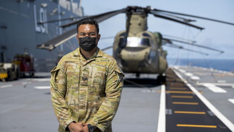 Army soldier Sergeant Alefosio Kakala on the flight deck of HMAS Adelaide during Operation Tonga Assist 2022. Photo: Corporal Robert Whitmore