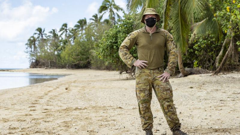 Army soldier Corporal Daniel Norrie on Pangaimotu Island, Tonga, as part of HMAS Adelaide's amphibious beach team. Photo: Petty Officer Jake Badior