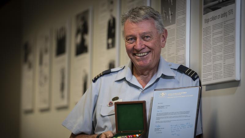 Wing Commander Ian Warburton was presented his third Federation Star and seventh clasp to his Defence Long Service Medal after 52 years of service. Photo: Corporal Melina Young