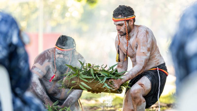 The Murrook Cultural Heritage Team conduct a smoking ceremony at No. 41 Wing's naming ceremony at RAAF Base Williamtown, New South Wales. Photos: Leading Aircraftman Samuel Miller