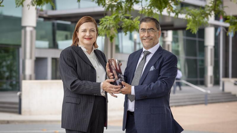 Chief Defence Scientist, Professor Tanya Monro presents Dr Alex Kalloniatis, right, with the 2021 Defence Minister’s Award for Achievement in Science in Canberra, ACT. Photo: Ms Nicole Mankowski