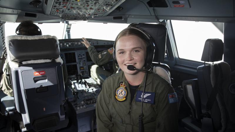 Air Force crew attendant Leading Aircraftwoman Hannah Heaney supports aircrew on board a KC-30A during air-to-air refuelling operations with a P-8A Poseidon as part of Exercise Diamond Seas 2022. Photo: Leading Aircraftwoman Kate Czerny