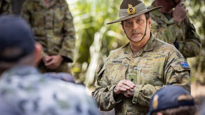 Commander of the Operation Flood Assist joint task force, Major General David Thomae, meets with Royal Australian Navy sailors in Knox Park, New South Wales, to thank them for their work. Photo: Corporal Jonathan Goedhart
