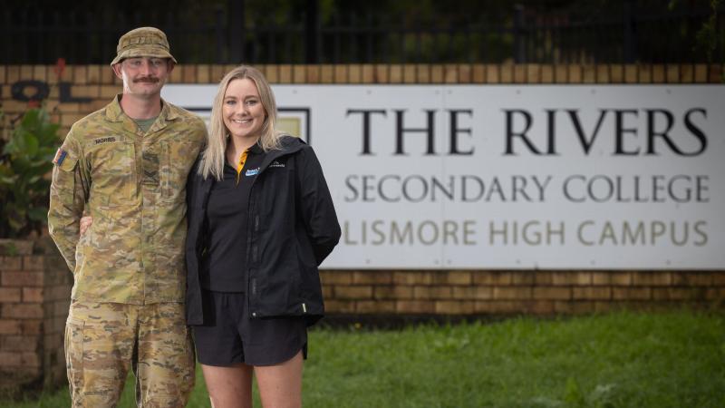 Corporal Charlie Morris and his sister Georgie Morris at the Rivers Secondary College in Lismore during Operation Flood Assist. Photo: Corporal Jonathan Goedhart