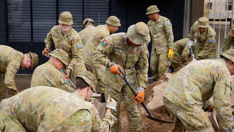 Soldiers deployed on Operation Flood Assist 2022 in Lismore, New South Wales, are making preparations to support local communities by door knocking, sandbagging and assisting with the relocation of residents. Photo: Corporal Jonathan Goedhart