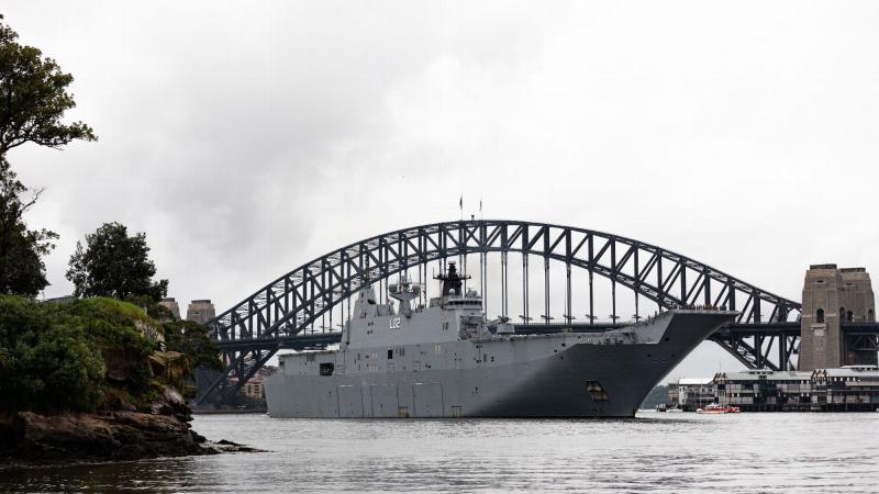 Royal Australian Navy ship HMAS Canberra returns to her home port in Sydney, New South Wales, after deploying on Operation Tonga Assist 2022. Photo: Leading Seaman David Cox