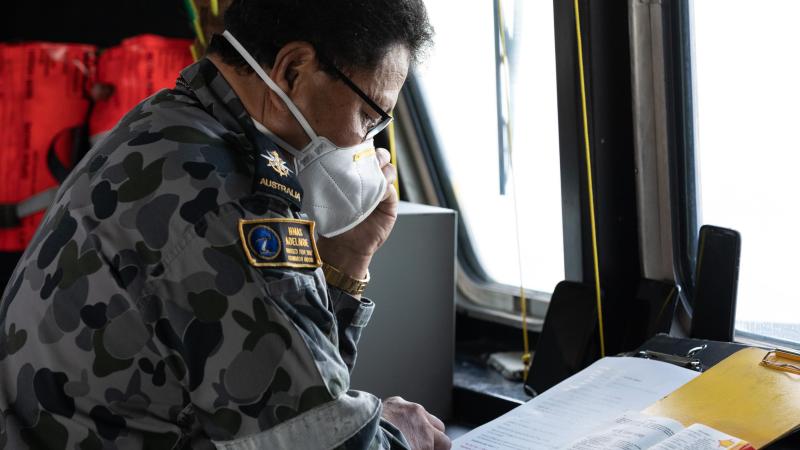 Chaplain Simote Finau delivers a Sunday prayer live on air on Radio Tonga from HMAS Adelaide during Operation Tonga Assist 2022. Photo: Leading Seaman David Cox