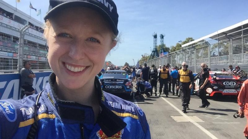 Leading Seaman Sarah Battenally in pit lane as a participant in the Navy V8 Supercars placement program in 2015.