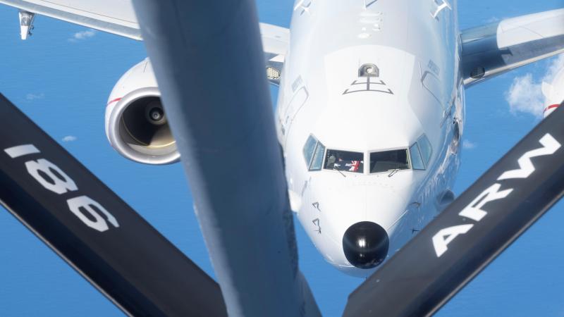 A Royal Australian Air Force P-8A Poseidon from No. 11 Squadron prepares to be refuelled by a United States Air Force KC-135 Stratotanker during a training mission near the Philippine Sea. Photo: Airman 1st Class Kaitlyn Preston