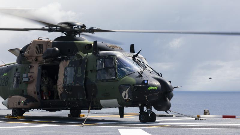 The 808 Squadron MRH-90 Taipan helicopter prepares to take-off from HMAS Canberra during Operation Tonga Assist 2022. Photo: Leading Seaman Daniel Goodman