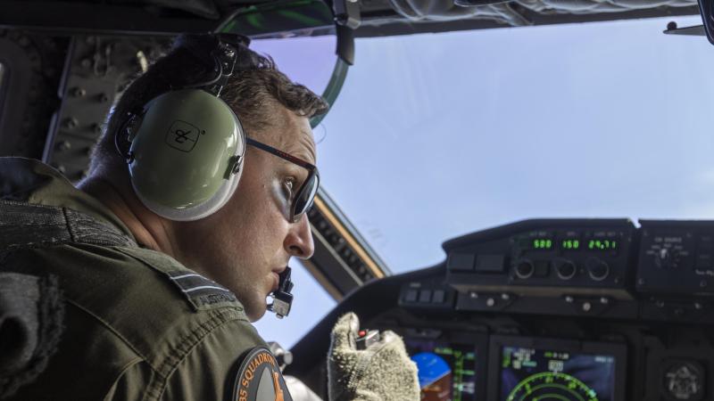 Air Force pilot Flight Lieutenant Andrew Burgess flies a C-27J Spartan during a maritime surveillance flight off Palau as part of Operation Solania. Photo: Leading Seaman Nadav Harel