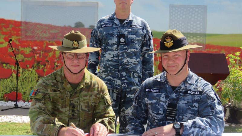 Colonel Colin Blyth, left, takes over from Group Captain Jason Bowles, right, as Commander of Headquarters Middle East. Photo: Leading Aircraftwoman Hannah Schaefer
