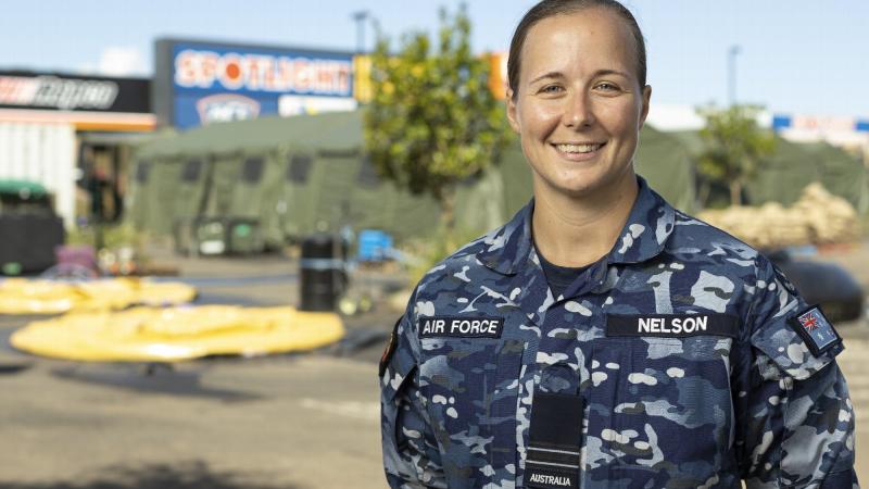 Royal Australian Air Force officer Flight Lieutenant Darby Nelson from No. 17 Squadron deployed at the Spotlight Trans-Shipment Area in Lismore, during Operation Flood Assist 2022.