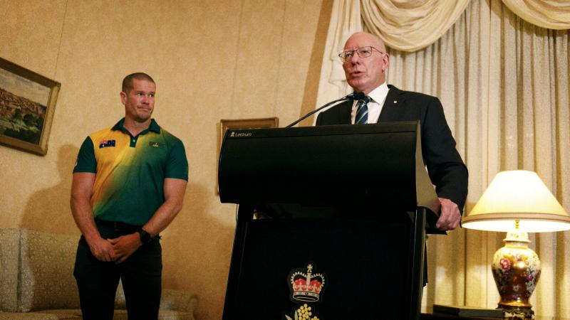 Governor-General General (retd) David Hurley congratulates Peter Brown  as Australia's Invictus Games flag bearer during the farewell function at Admiralty House in Sydney. Photo: Sergeant Oliver Carter