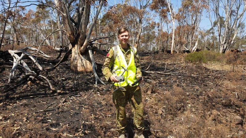 Bombardier Christopher Dawson Army holds an unmanned aerial vehicle used on its first domestic mission during Operation Bushfire Assist.