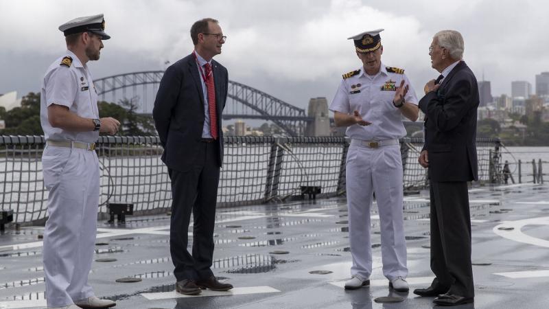 Executive Officer of HMAS Hobart, Lieutenant Commander Michael Rhys-Jones, left, with Vice Admiral (retd) Peter Jones, Commanding Officer of HMAS Hobart; Commander Andrew Pepper, and Rear Admiral (retd) Guy Griffiths. Photo: Corporal Jacob Joseph