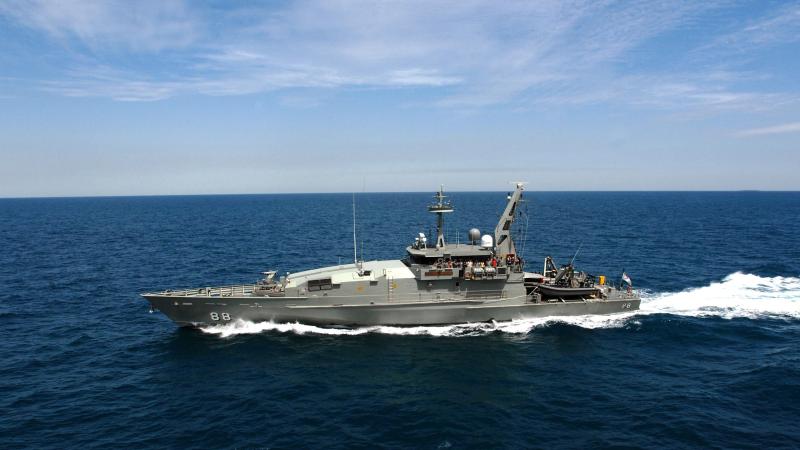 HMAS Maitland conducting approaches and formation with HMAS Melbourne during her family cruise.