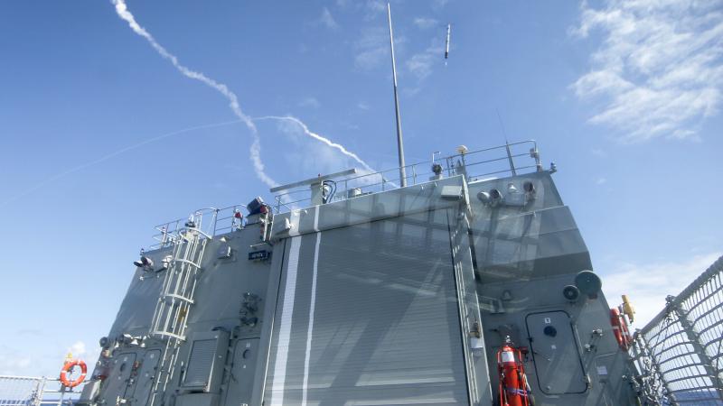 HMAS Perth launches the Nulka missile decoy system during the surface-to-air missile exercise during Exericise Rim of the Pacific. 
