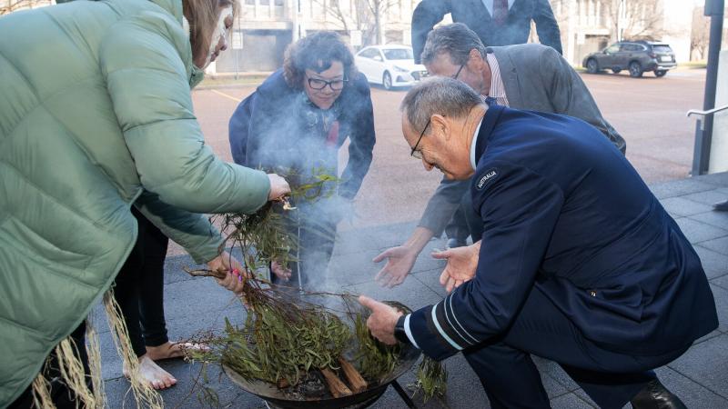 The new Defence Indigenous Champions, Deputy Secretary Celia Perkins and Chief of Air Force Air Marshal Mel Hupfeld, take part in a Smoking Ceremony and Welcome to Country at the inaugural Defence Indigenous Champion Handover Ceremony in Canberra.