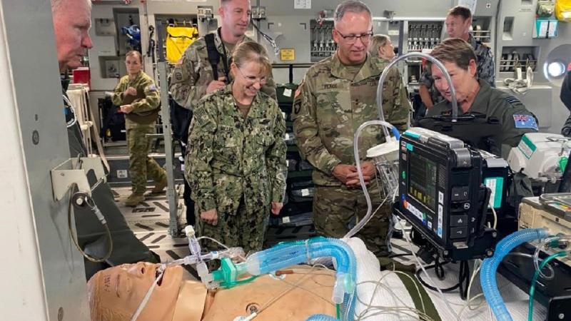 US Indo-Pacific Command Command Surgeon Rear Admiral Pamela Miller and Major General Michael Place watch a capability demonstration of the No. 3 Aeromedical Evacuation Squadron C-17 patient evacuation platform at RAAF Base Amberley in Queensland.